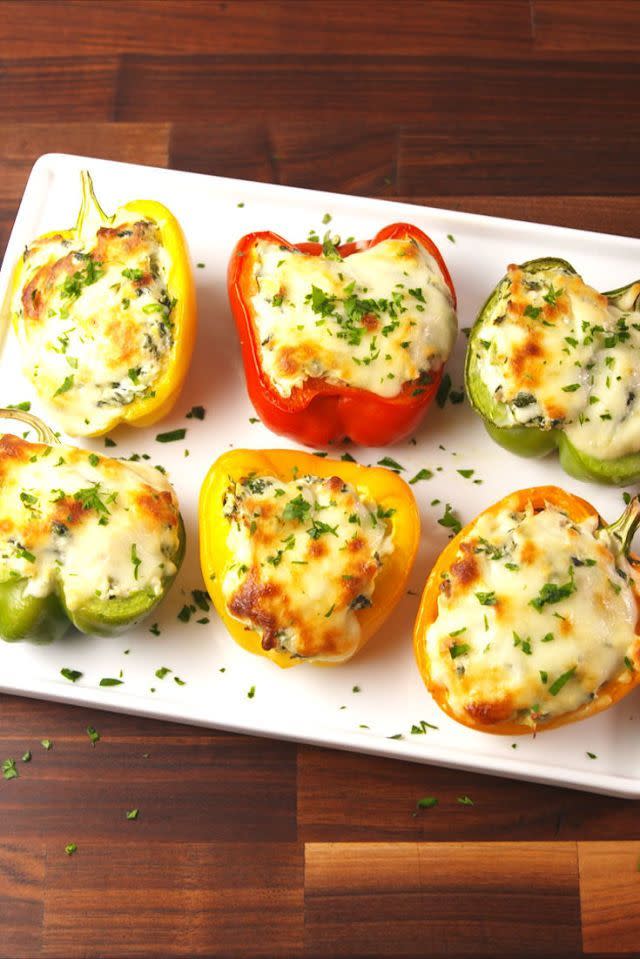 <p>Your favourite dip turned into a meal!</p><p>Get the <a href="https://www.delish.com/uk/cooking/recipes/a31220007/spinach-artichoke-stuffed-peppers-recipe/" rel="nofollow noopener" target="_blank" data-ylk="slk:Spinach Artichoke Stuffed Peppers;elm:context_link;itc:0" class="link ">Spinach Artichoke Stuffed Peppers</a> recipe.</p>