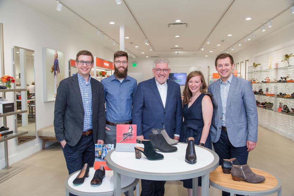 The Sajdak family, owners of Stan's Fit For Your Feet, pose for a picture in one of their stores. The company announced it would be expanding to Niles, Illinois.