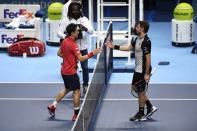 Britain Tennis - Barclays ATP World Tour Finals - O2 Arena, London - 14/11/16 Japan's Kei Nishikori shakes hands with Switzerland's Stanislas Wawrinka after winning their round robin match Action Images via Reuters / Tony O'Brien Livepic