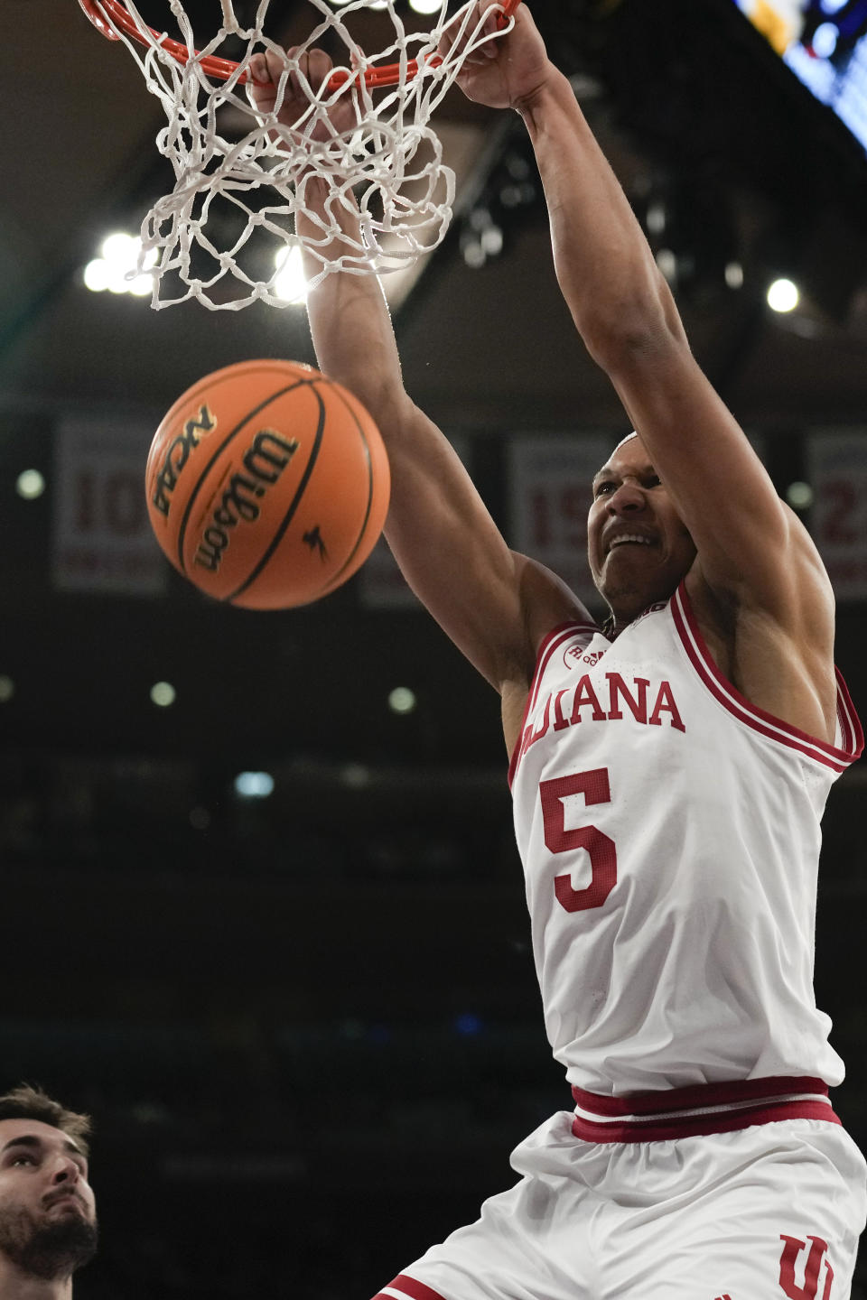 Indiana's Malik Reneau dunks during the first half of an NCAA college basketball game against UConn, Sunday, Nov. 19, 2023, in New York. (AP Photo/Seth Wenig)