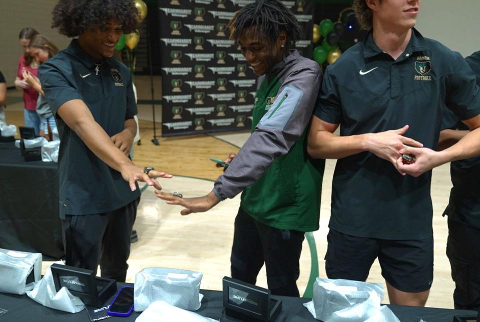 May 1, 2023; Phoenix, Ariz.; USA; Basha football players show off their new rings at a State Championship Ring Ceremony at Basha High School.