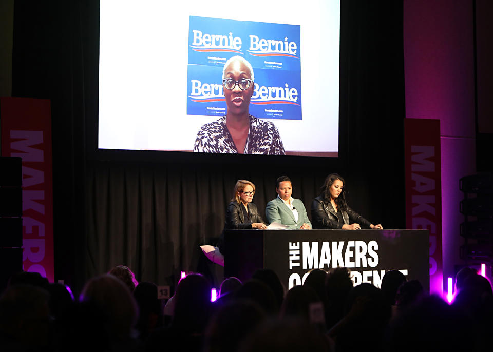 (L-R) Katie Couric, Editor-in-Chief of HuffPost Lydia Polgreen and National Politics Reporter of Yahoo News Brittany Shepherd, with Nina Turner onscreen, speak onstage during the 2020 MAKERS Conference at the InterContinental Los Angeles Downtown on February 10, 2020 in Los Angeles, Calif. (Photo by Rachel Murray/Getty Images for MAKERS)