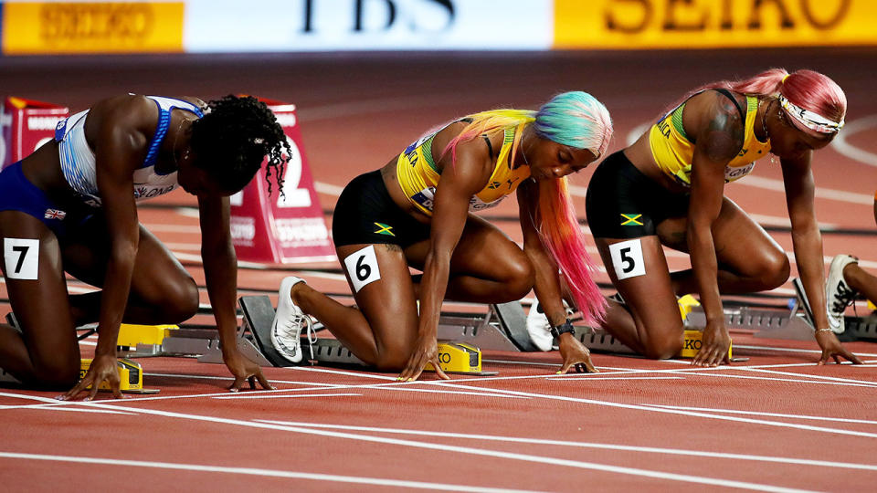 Dina Asher-Smith, Shelly-Ann Fraser-Pryce and Elaine Thompson, pictured here before the women's 100m final.