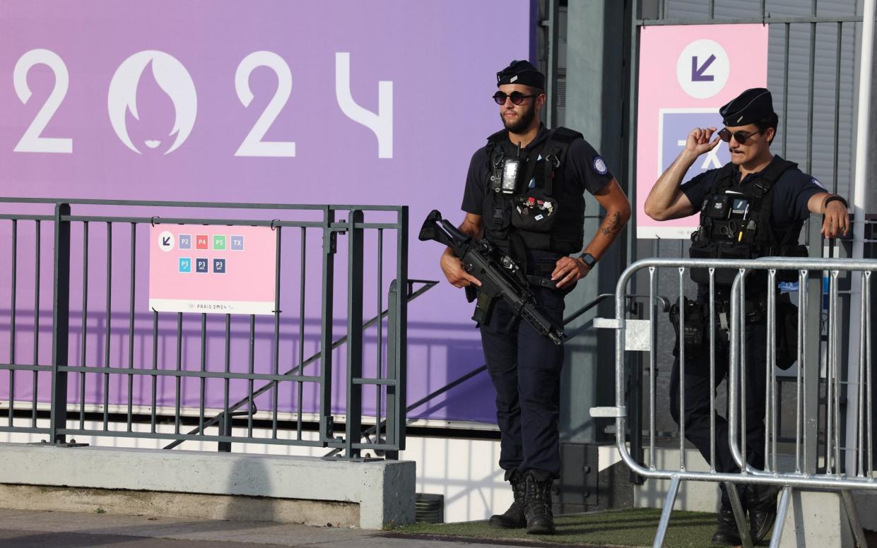 General view of police officers outside the stadium before the closing ceremony.