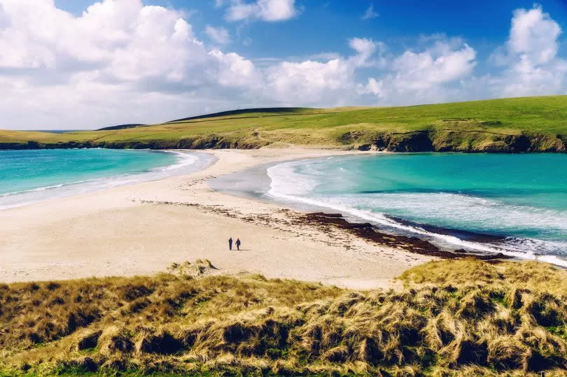 Sandbar, known as a tombolo, connecting St Ninian's Isle with the mainland of the Shetland Islands