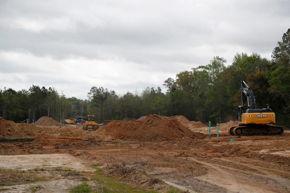 Site prep work is underway on a new commercial and residential development in Guyton.