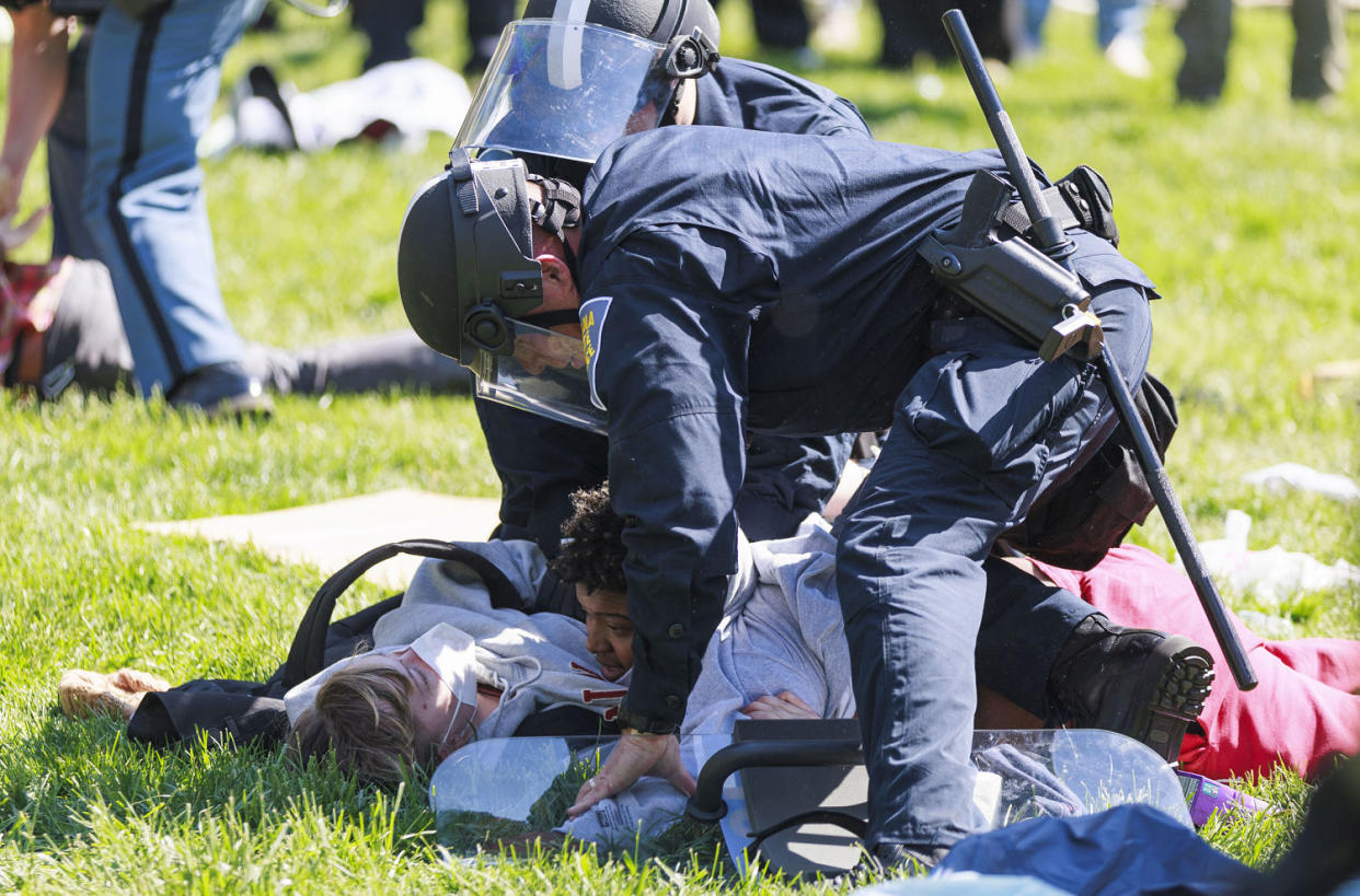 Dozens of people are arrested by the Indiana State Police riot squad during a pro-Palestinian protest on Indiana University's campus (Jeremy Hogan / Sipa via AP)