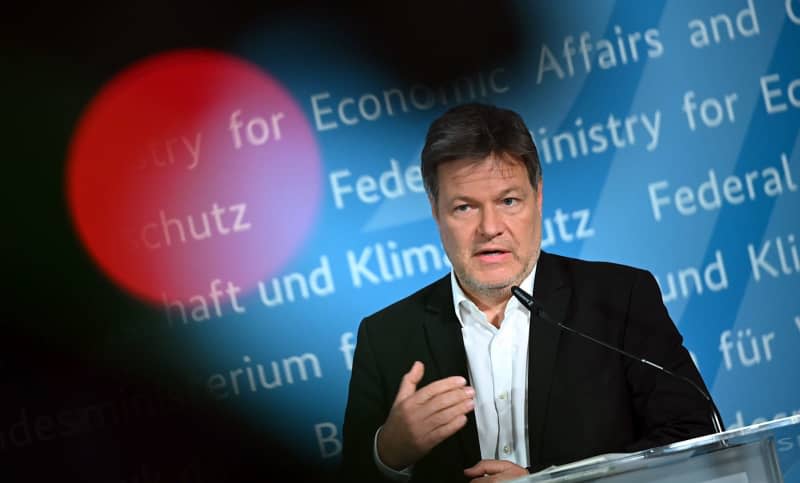 Robert Habeck, Germany's Vice-Chancellor and Economy Minister, speaks after a meeting with representatives of the security and defence industry. Britta Pedersen/dpa