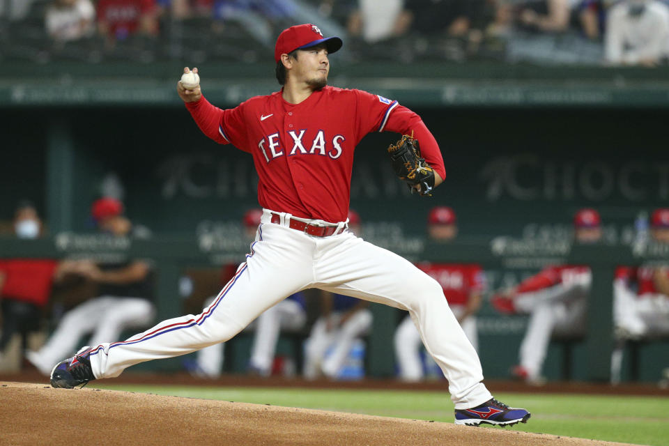 Texas Rangers starting pitcher Kohei Arihara throws during the first inning against the San Diego Padres in a baseball game Friday, April 9, 2021, in Arlington, Texas. (AP Photo/Richard W. Rodriguez)