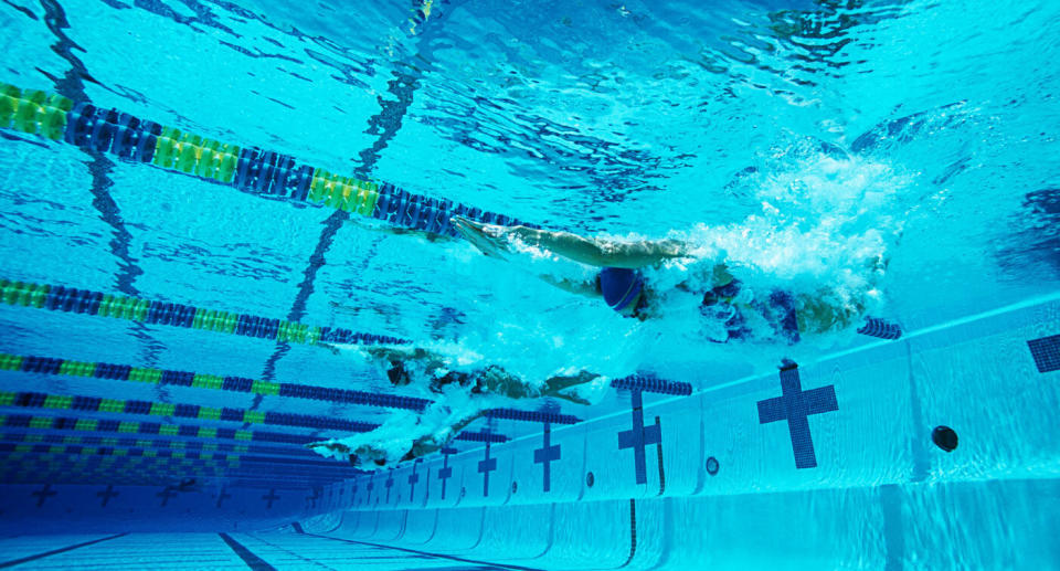 Photo of a stock public swimming pool.