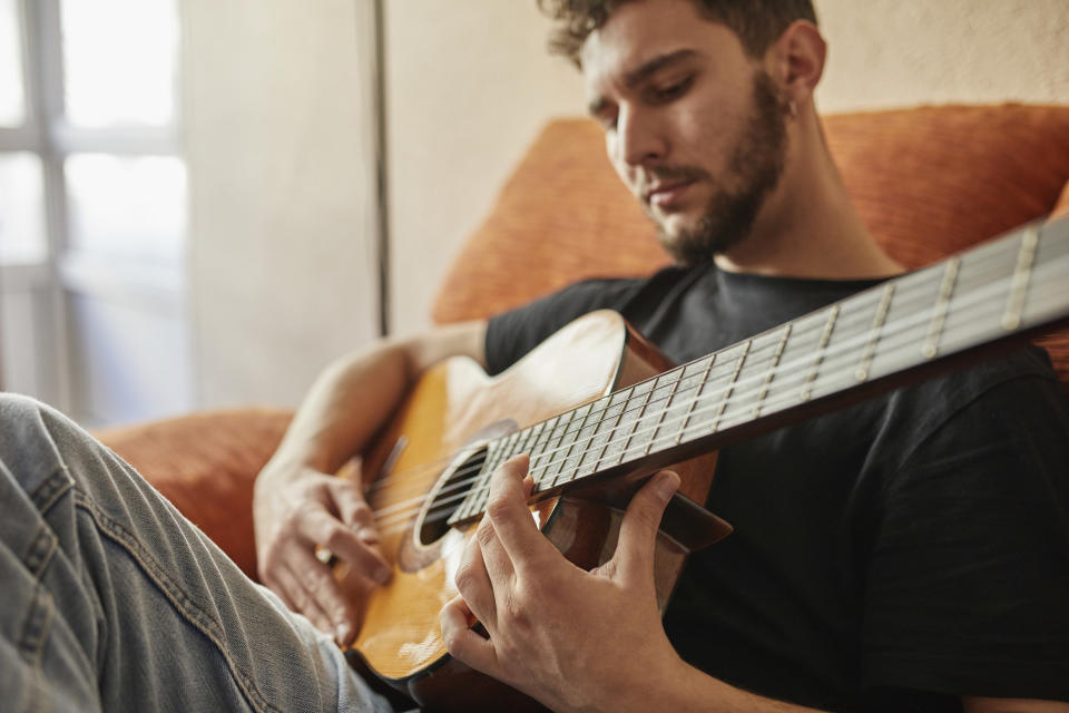 Man playing the guitar