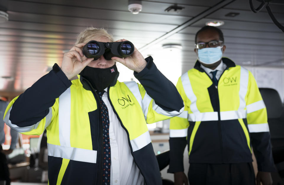 <p>Prime Minister Boris Johnson on the bridge of the Esvagt Alba during a visit to the Moray Offshore Windfarm East, off the Aberdeenshire coast, during his visit to Scotland. Picture date: Thursday August 5, 2021.</p>
