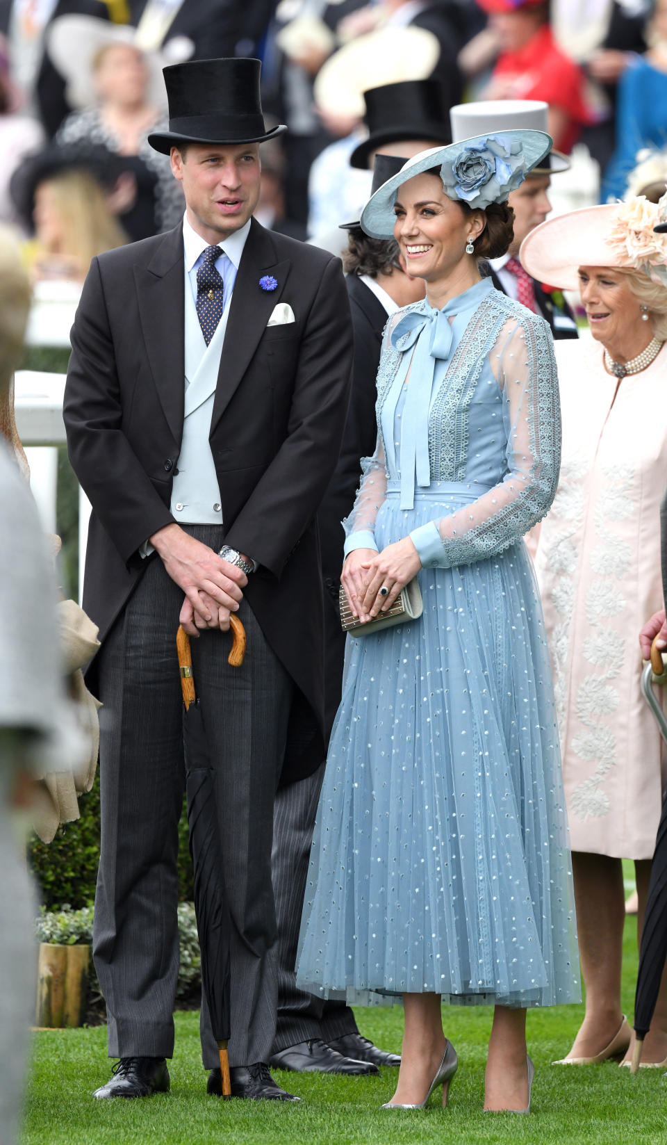 The couple co-ordinated beautifully for the occasion with Kate in a duck egg blue lace Elie Saab skirt and blouse combo and William in a duck egg blue waistcoat. <em>[Photo: Getty]</em>