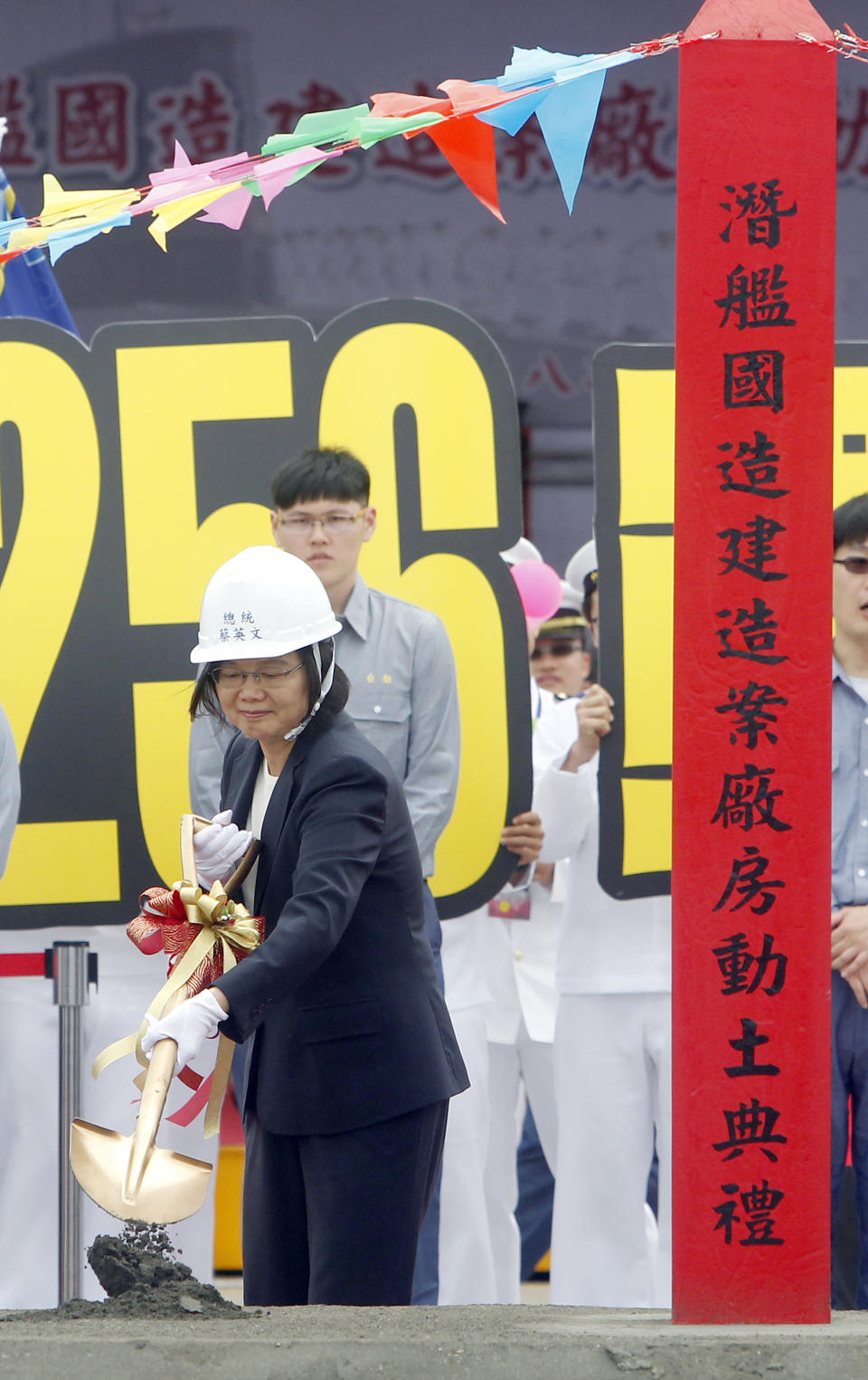 Taiwan's President Tsai Ing-wen breaks ground for Taiwan navy''s indigenous submarine factory during a groundbreaking ceremony in Kaohsiung, southern of Taiwan, Thursday, May 9, 2019. (AP Photo/Chiang Ying-ying)