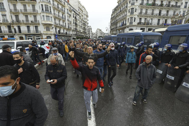 Algerians demonstrate in Algiers to mark the second anniversary of the Hirak movement, Monday Feb. 22, 2021. February 22 marks the second anniversary of Hirak, the popular movement that led to the fall of Algerian President Abdelaziz Bouteflika. (AP Photo/Anis Belghoul)