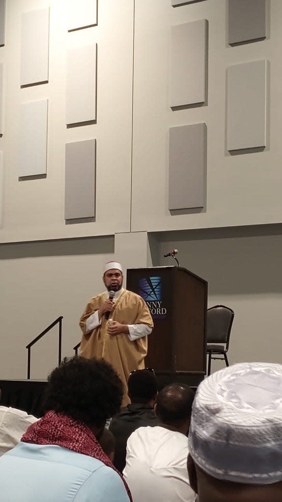 Imam Abdelaziz Hassan El-Sheikh leads the Eid al-Adha prayer Wednesday, June 28, 2023, at the Denny Sanford Premier Center.