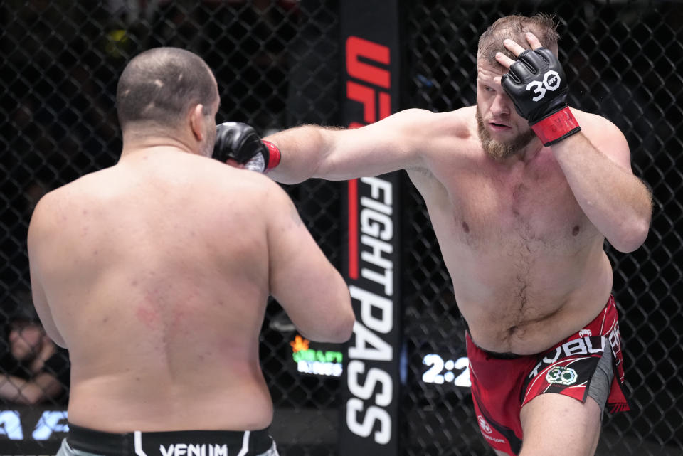 LAS VEGAS, NEVADA – FEBRUARY 04: (R-L) Marcin Tybura of Poland punches Blagoy Ivanov of Bulgaria in a heavyweight fight during the UFC Fight Night event at UFC APEX on February 04, 2023 in Las Vegas, Nevada. (Photo by Jeff Bottari/Zuffa LLC via Getty Images)