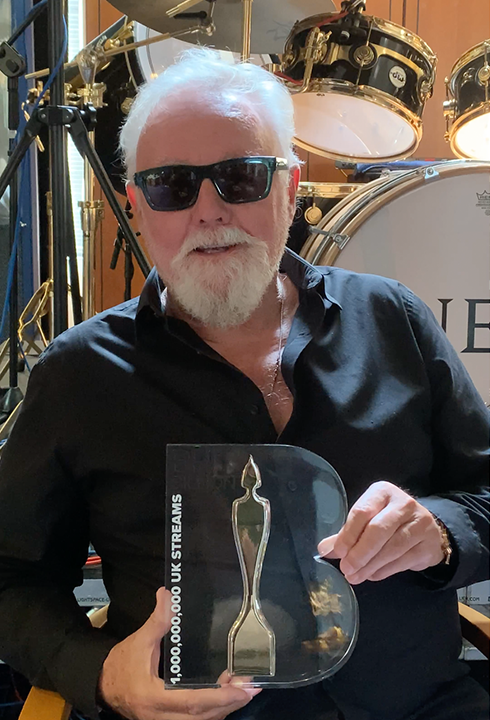 Roger Taylor with his award (BPI/PA)