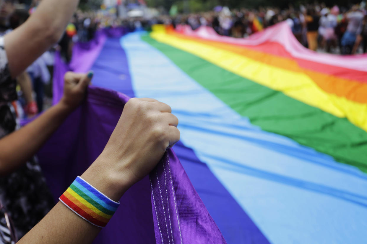 The NFL and MLB will participate in the New York City Pride March for the first time later this month, joining the NBA, WNBA, NHL and multiple other professional sports leagues in the event. (AP Photo/Nelson Antoine)