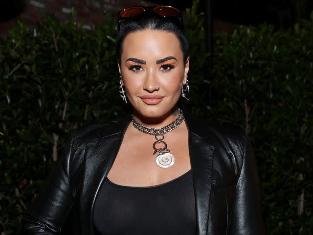 <p>Amy Sussman/Getty</p> Demi Lovato at the KLUTCH Sports Group x UTA Dinner in 2022.