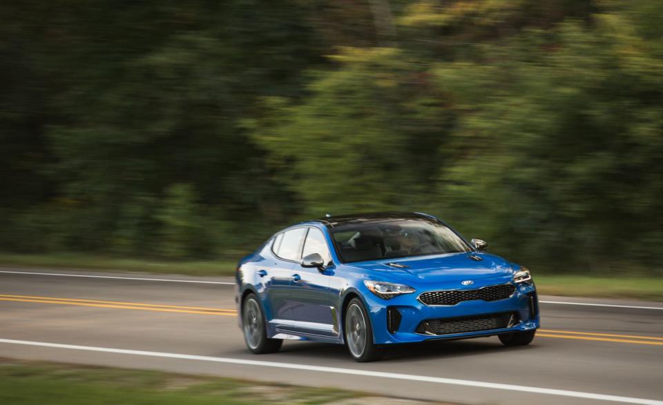 <p>Kia’s BMW fighter, the Stinger, provides strong performance at a budget-friendly price. The base engine is a 255-hp turbocharged 2.0-liter inline-four; a 365-hp twin-turbo 3.3-liter V-6 is optional. Both models have an eight-speed automatic and either rear- or all-wheel drive. A 7.0-inch touchscreen is standard. Available driver aids include adaptive cruise control, automated emergency braking, and lane-keeping assist. An optional 15-speaker Harman/Kardon audio system kicks out the jams. <a rel="nofollow noopener" href="https://www.caranddriver.com/kia/stinger" target="_blank" data-ylk="slk:READ MORE ››;elm:context_link;itc:0;sec:content-canvas" class="link ">READ MORE ››</a></p>