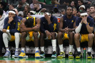 Indiana Pacers sit on the bench while trailing the Boston Celtics by 50 points late in the second half of an NBA basketball game, Wednesday, Nov. 1, 2023, in Boston. The Celtics won 155-104. (AP Photo/Charles Krupa)