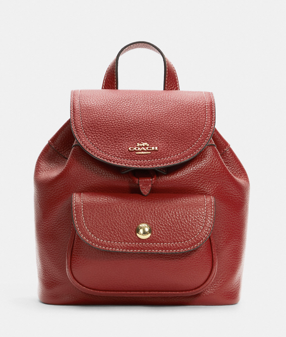 red leather Pennie Backpack 22 (Photo via Coach Outlet)