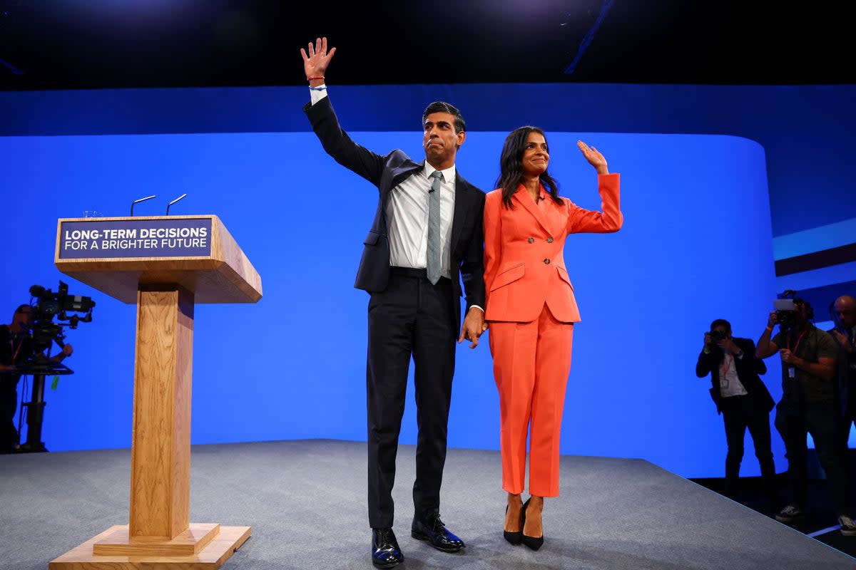 Rishi Sunak and his wife at Tory conference Akshata Murthy (Reuters)