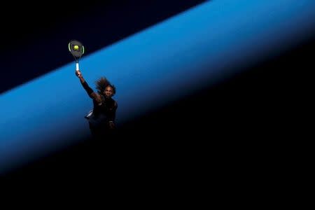 Serena Williams of the U.S. serves during her women's singles third round tennis match against Nicole Gibbs of the U.S. in the Australian Open 2017 in Melbourne, Australia January 21, 2017. REUTERS/Jason Reed/Files