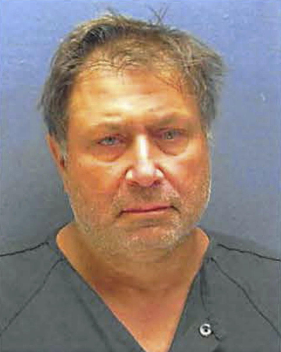 FILE - This Nov. 21, 2018, booking file photo provided by the Ocean Township Police Department shows Paul Caneiro. Caniero has been charged with setting his own family home on fire on the same day as fire destroyed his brother and business partner's home home. The bodies of his brother, sister-in-law and their two children were found at Keith Canerio's Colts N.J. home. No one has yet been charged for their murders. (Ocean Township Police Department, File)