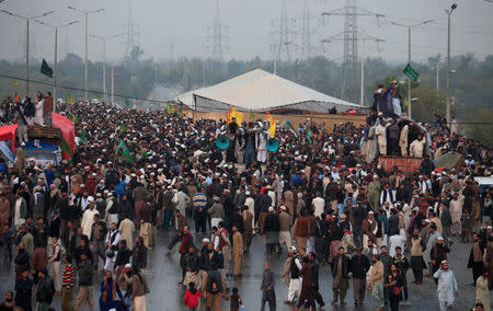 Members of the Tehreek-e-Labaik Pakistan, an Islamist political party, gather during a sit-in in Rawalpindi, Pakistan November 17, 2017. REUTERS/Faisal Mahmood