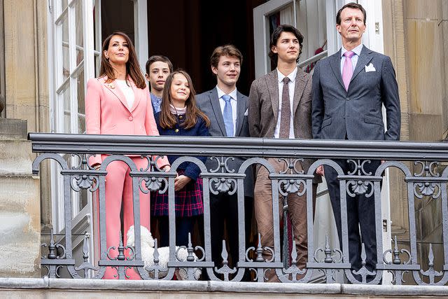 <p> Patrick van Katwijk/Getty Images</p> (From left) Princess Marie, Count Henrik, Countess Athena, Count Felix, Count Nikolai and Prince Joachim on the balcony of Amalienborg Palace for Queen Margrethe's birthday in April 2023.