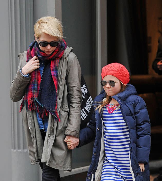 Michelle Williams and her daughter, Matilda Ledger, walking together in 2013. (Photo: NCP/Star Max via Getty Images)