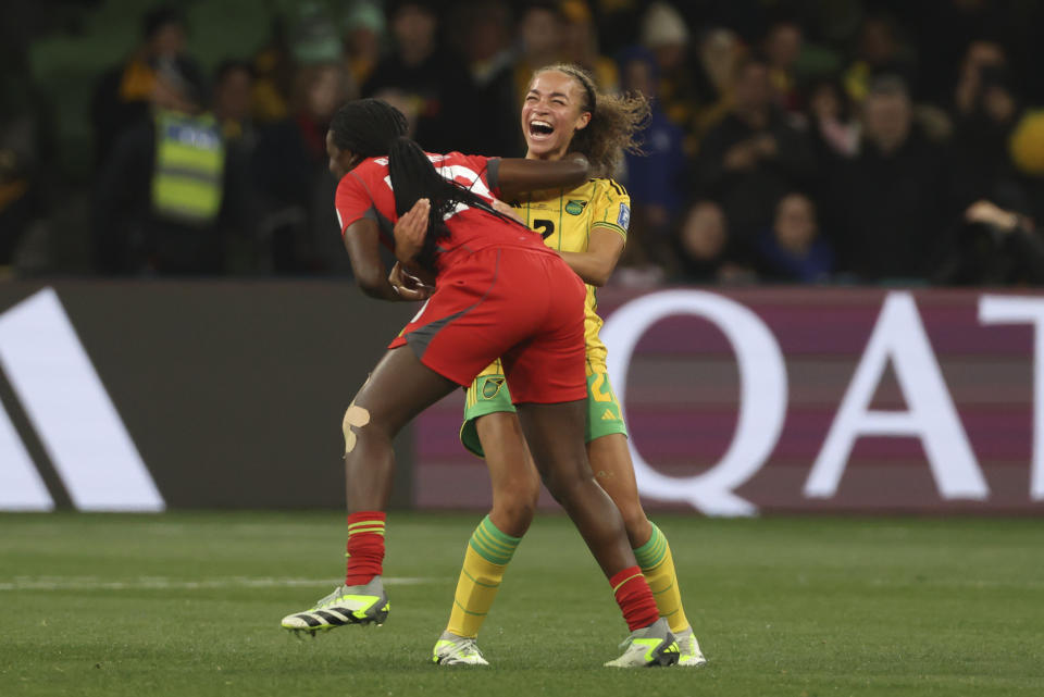 Jamaica's Solai Washington, celebrates with her teammate after the Women's World Cup Group F soccer match between Jamaica and Brazil in Melbourne, Australia, Wednesday, Aug. 2, 2023. (AP Photo/Hamish Blair)