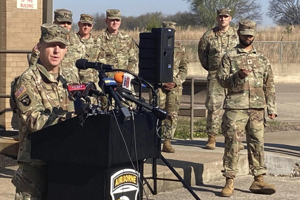 Military officials hold a news conference in Fort Campbell, KY, on Thursday March 30, 2023, to discuss a fatal helicopter crash. Nine people were killed in a crash involving two Army Black Hawk helicopters conducting a nighttime training exercise in Kentucky, a military spokesperson said. (AP Photo/Sharon Johnson)