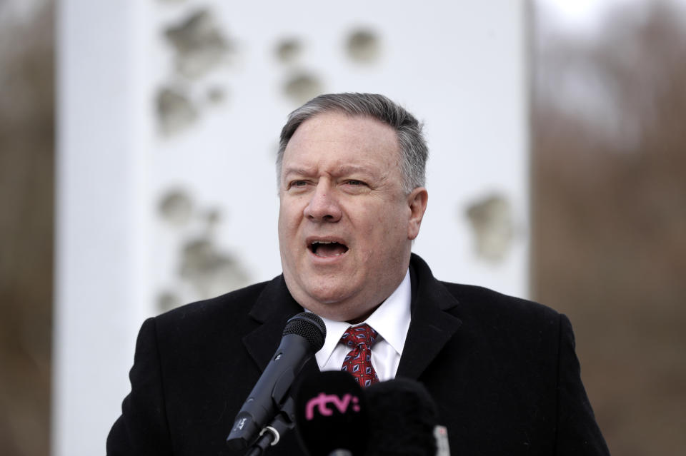 US Secretary of State Mike Pompeo delivers a speech at the Freedom Gate memorial in Bratislava, Slovakia, Tuesday, Feb. 12, 2019. Pompeo on Tuesday invoked the 30th anniversary of the demise of communism to implore countries in Central Europe to resist Chinese and Russian influence. (AP Photo/Petr David Josek)