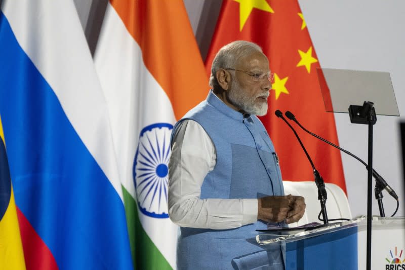 <cite>2023年8月22日，印度總理莫迪到南非參加金磚國家（BRICS）峰會。（AP）</cite>
