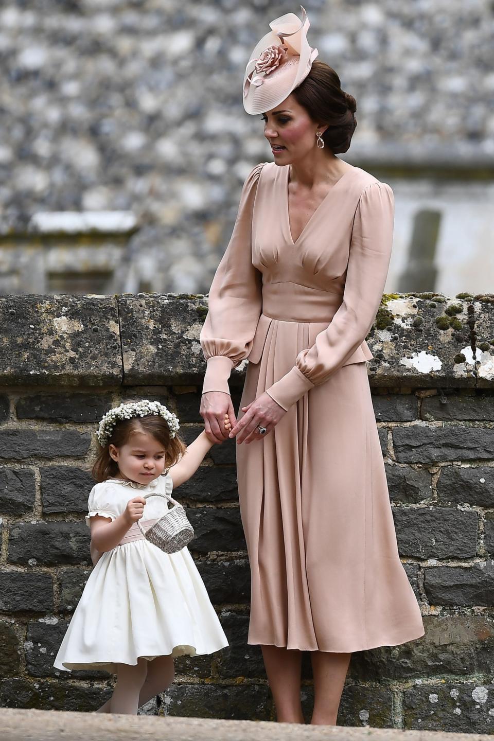 <p>The mother and daughter waited around together — and even that looked cute! (Photo: PA) </p>