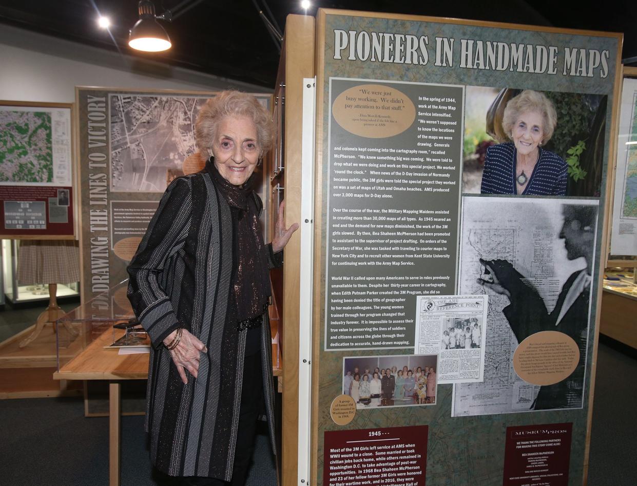 Bea McPherson is shown with the Military Mapping Maidens exhibit at MAPS Air Museum in Green on Friday, May 6, 2022.