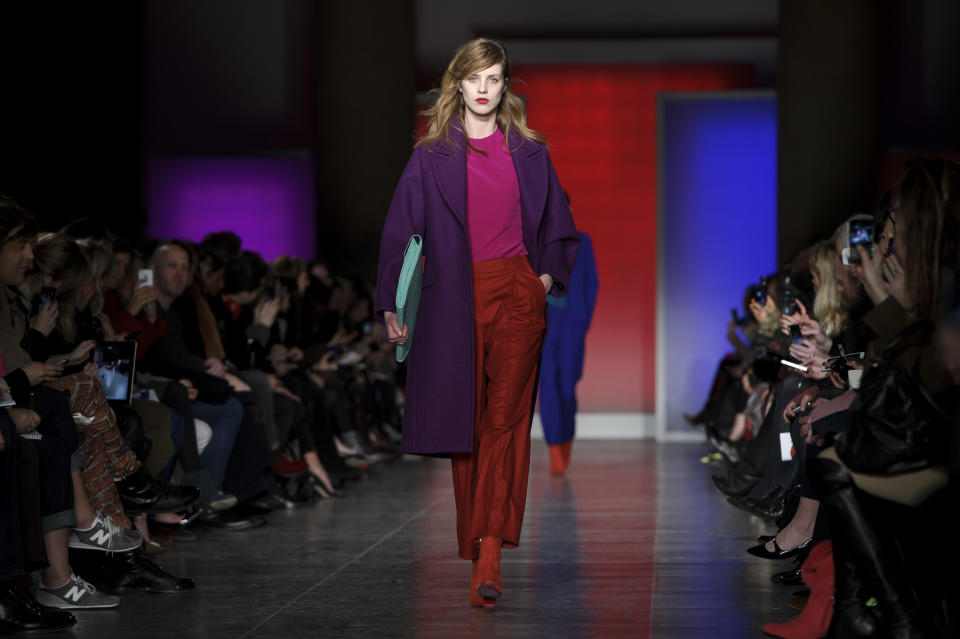 A model wears a design from the Paul Smith collection during London Fashion Week, Sunday, Feb. 17, 2013, London. (Photo by Jonathan Short/Invision/AP)