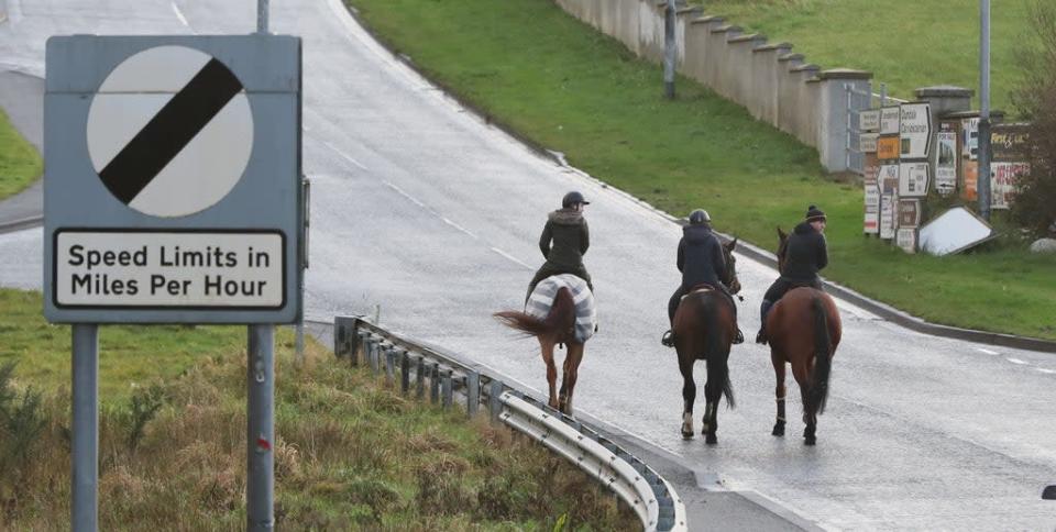 A group of horse riders crosses the border from the Republic of Ireland in to Northern Ireland (Niall Carson/PA) (PA Archive)