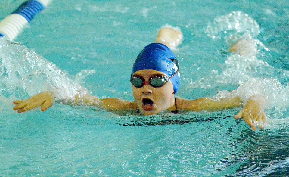 TyLynn Wellnitz of the Milbank Lions Swim Club heads to the finish in the mixed 12-and-under 100-yard butterfly over the weekend in the Optimist High Point Swim Meet at the Prairie Lakes Wellness Center.