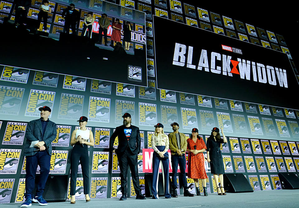 SAN DIEGO, CALIFORNIA - JULY 20: (L-R) President of Marvel Studios Kevin Feige, Scarlett Johansson, David Harbour, Florence Pugh, O-T Fagbenle, Director Cate Shortland and Rachel Weisz of Marvel Studios' 'Black Widow' at the San Diego Comic-Con International 2019 Marvel Studios Panel in Hall H on July 20, 2019 in San Diego, California. (Photo by Alberto E. Rodriguez/Getty Images for Disney)