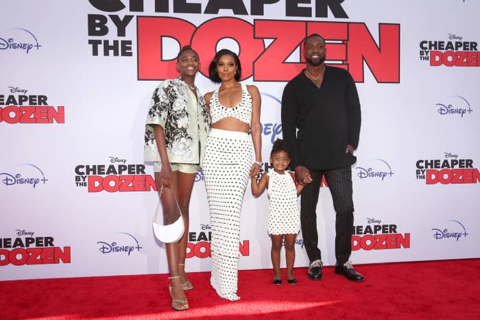 Dwyane, Gabrielle, and Zaya on the red carpet