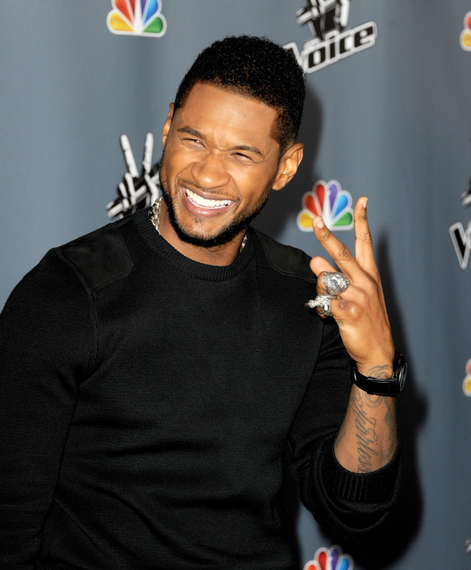 LOS ANGELES, CA - MARCH 20:  Singer Usher arrives at a screening of NBC's 'The Voice' Season 4 at the Chinese Theatre on March 20, 2013 in Los Angeles, California.  (Photo by Kevin Winter/Getty Images)