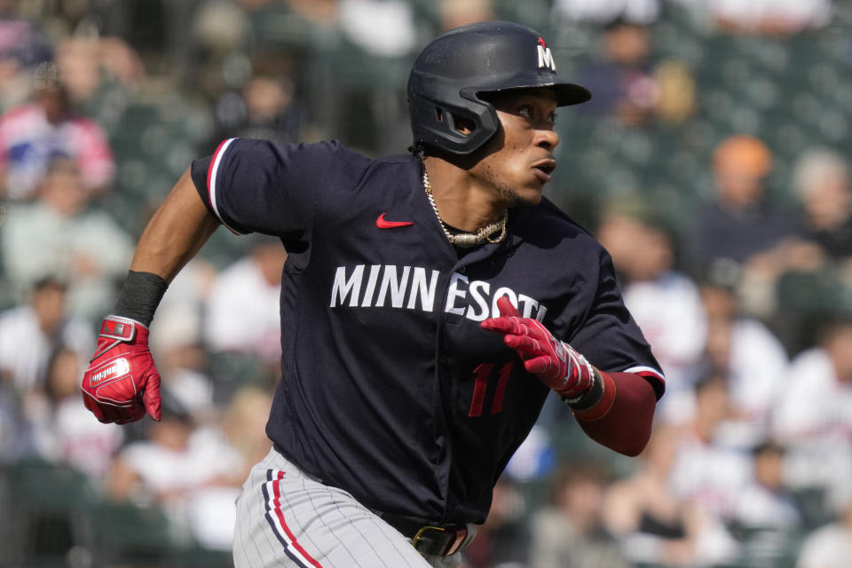 Minnesota Twins' Jorge Polanco rounds the bases after hitting a solo home run during the eighth inning of a baseball game against the Chicago White Sox in Chicago, Sunday, Sept. 17, 2023. (AP Photo/Nam Y. Huh)