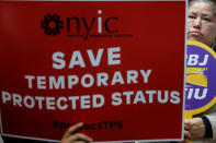 <p>Salvadoran immigrant Minda Hernandez watches on during a news conference at the New York Immigration Coalition following U.S. President Donald Trump’s announcement to end the Temporary Protection Status for Salvadoran immigrants in Manhattan, New York City, Jan. 8, 2018. (Photo: Andrew Kelly/Reuters) </p>