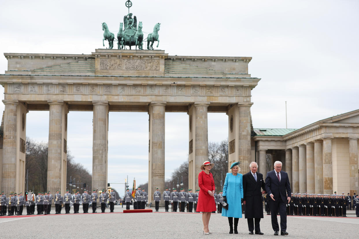 BERLIN, GERMANY - MARCH 29: (L-R) The German President's wife Elke Buedenbender, Britain's Camilla, Queen Consort, Britain's King Charles III and German President Frank-Walter Steinmeier attend a ceremonial welcome at Brandenburg Gate on March 29, 2023 in Berlin, Germany. Britain's King Charles III began his first state visit, having postponed a trip to France due to widespread political protests. Charles will undertake engagements in the German capital and in Brandenburg before heading to Hamburg during the three-day tour. (Photo by Adrian Dennis - Pool/Getty Images)