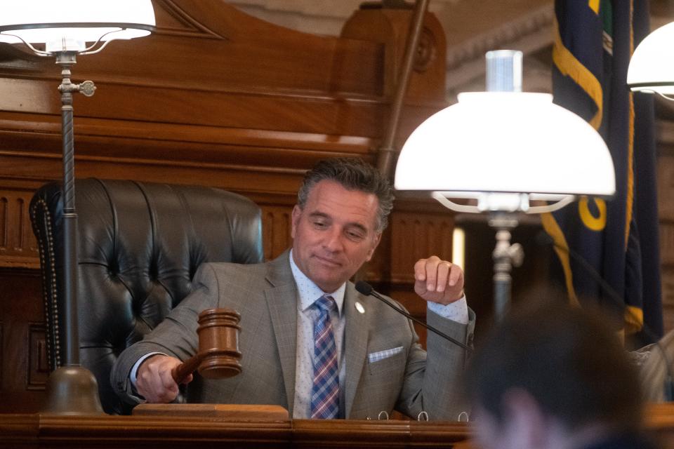 Senate President Ty Masterson, R-Andover, strikes his gavel a final time Monday afternoon closing out the 2022 senate session from the Statehouse.