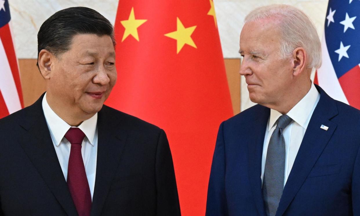 <span>China’s president, Xi Jinping, and his US counterpart, Joe Biden, meeting at the G20 summit in Bali, Indonesia, in November 2022.</span><span>Photograph: Saul Loeb/AFP/Getty Images</span>